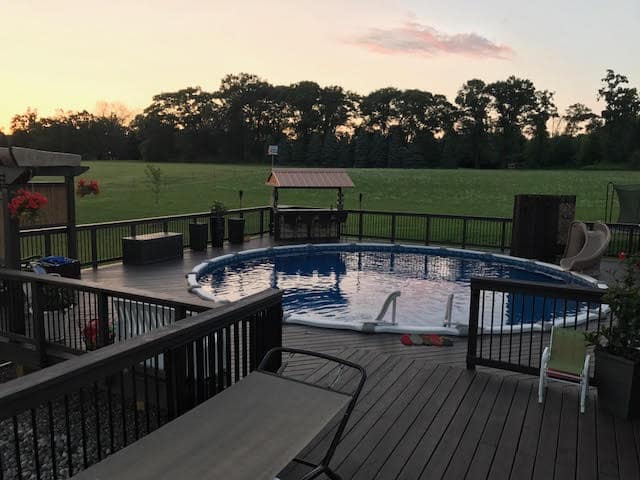 Above ground pool and deck.
