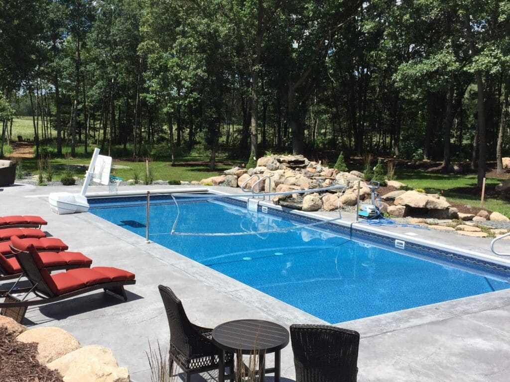 backyard pool with volleyball.