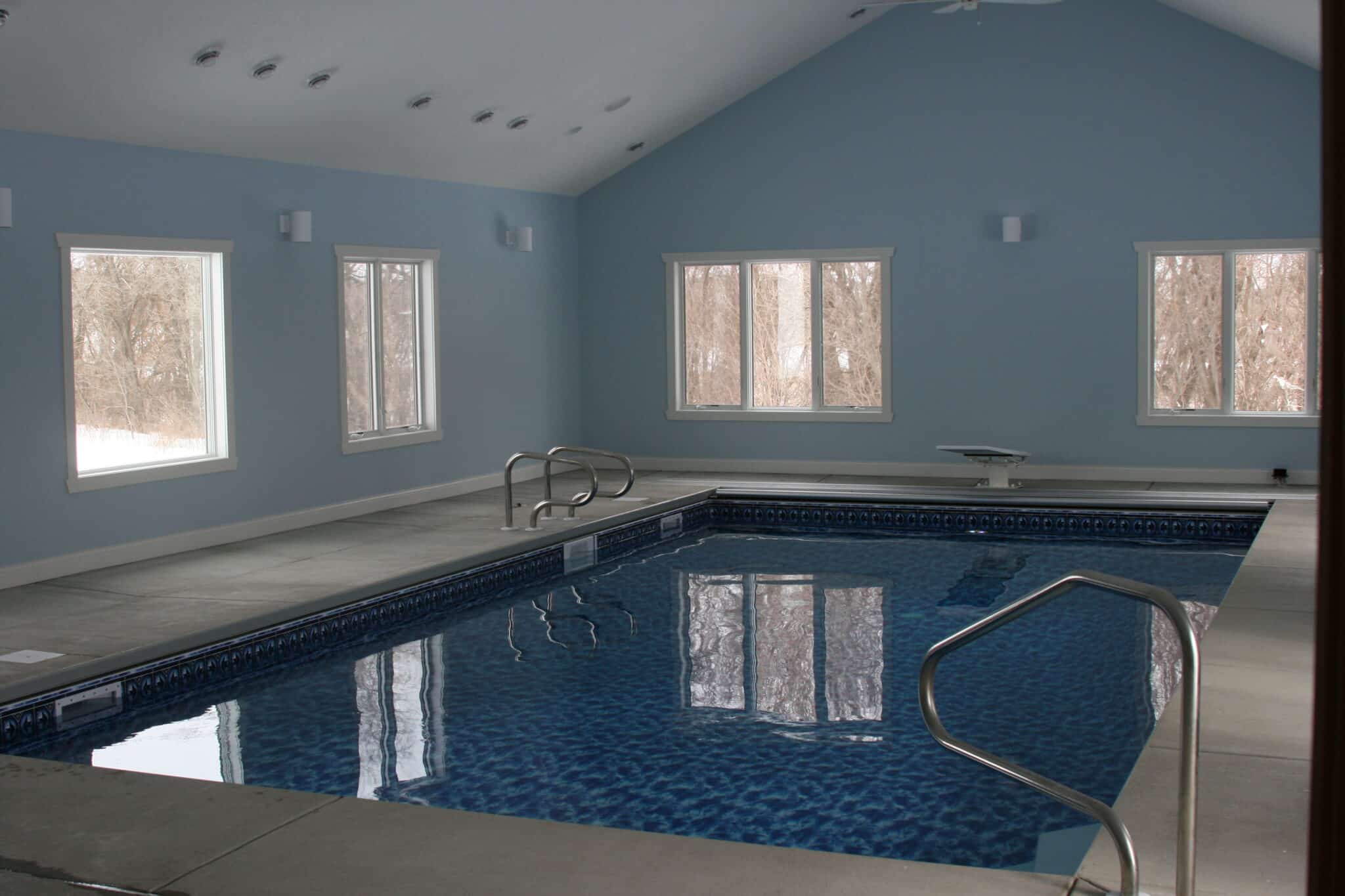 An image showcasing a swimming pool